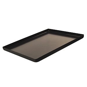 A black tray is sitting on top of the floor.