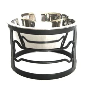 A black and silver bowl sitting on top of a table.